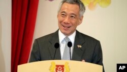 Singapore's Prime Minister Lee Hsien Loong delivers a speech at the Istana, July 5, 2017, in Singapore.
