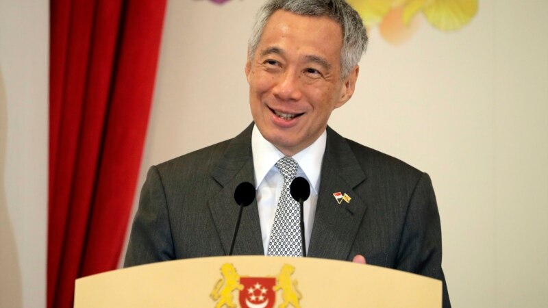 Singapore PM Reshuffles Cabinet with Succession Question Looming