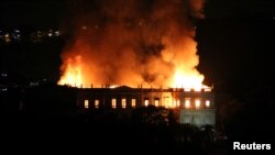 A fire blazes at the National Museum of Brazil in Rio de Janeiro, Brazil, Sept. 2, 2018 in this picture obtained from social media.