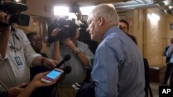 House Rules Committee Chairman Pete Sessions, R-Texas, answers questions from reporters as House Republicans try to bridge their party's internal struggle over immigration at a closed-door meeting on Capitol Hill in Washington, June 7, 2018. 