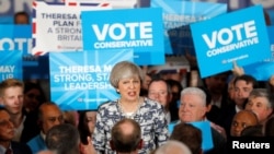 Britain's Prime Minister Theresa May speaks at an election campaign event in Solihull, June 7, 2017.