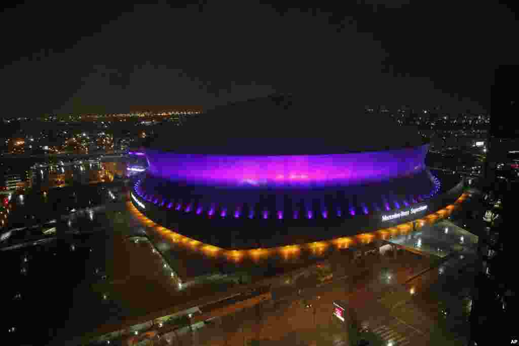 The Mercedes-Benz Superdome in New Orleans is lit up in the color purple to honor pop legend Prince, April 21, 2016.