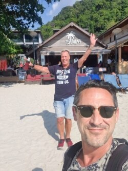 Colin Anderson (front) and Krijn Tol (back) regularly visit Thailand during the holiday seasons over the past 25 years.