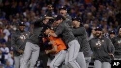 The Houston Astros celebrate after Game 7 of baseball's World Series against the Los Angeles Dodgers Wednesday, Nov. 1, 2017, in Los Angeles. The Astros won 5-1 to win the series 4-3. (AP Photo/Matt Slocum)