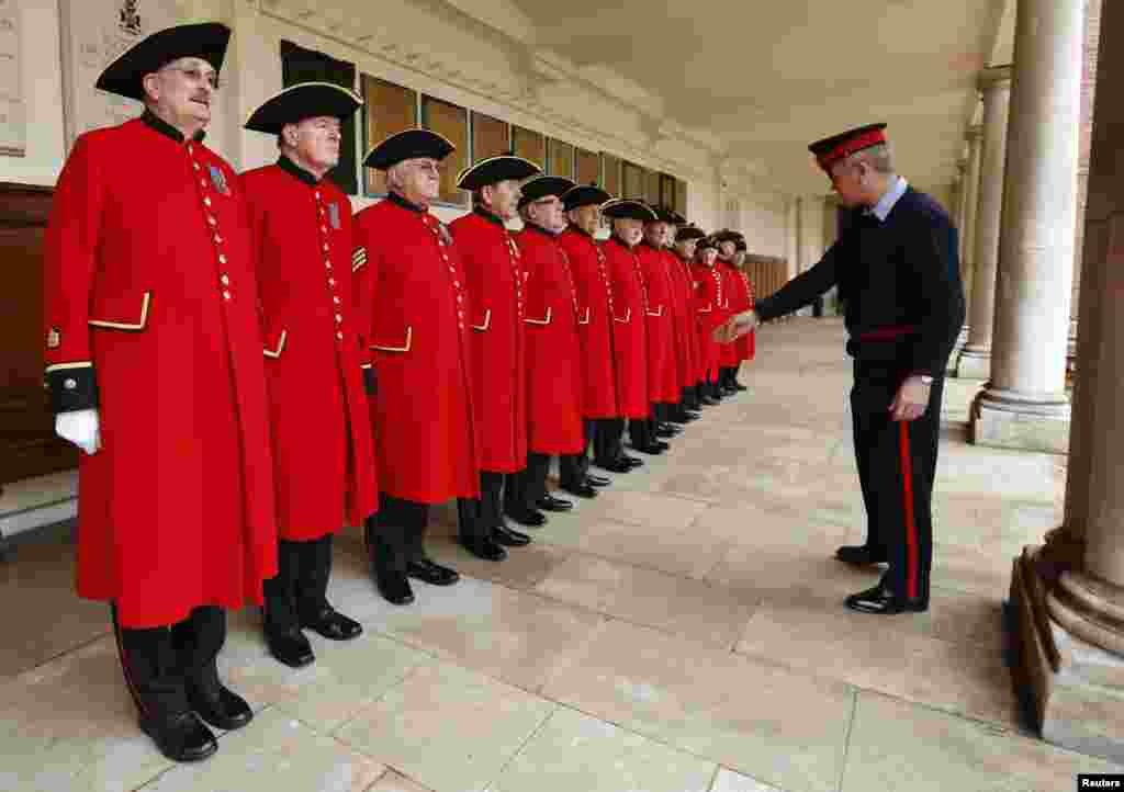 Sergeant Major Pearse Lally inspects Chelsea Pensioners, who will take part in the funeral of the late former British Prime Minister Margaret Thatcher, during a uniform inspection at the Royal Hospital Chelsea in London.