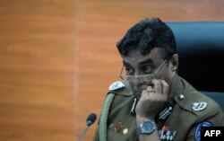 FILE - Sri Lanka police chief Pujith Jayasundara ia seen at police headquarters in Colombo, March 7, 2017.