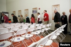 Voters arrive for an event with Republican U.S. presidential candidate Ben Carson (not pictured) at the visitors center in Gaffney, South Carolina, Feb. 11, 2016.