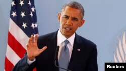 Presiden AS Barack Obama memberikan pernyataan dalam konferensi pers di Dakar, Senegal dalam lawatannya di Afrika (27/6).