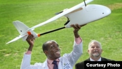 Pathologist Timothy Amukele, left, teamed with Robert Chalmers and other engineers to create a drone courier system that transports blood to diagnostic laboratories. (Credit: Johns Hopkins Medicine)