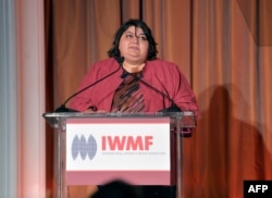FILE - Honoree Khadija Ismayilova speaks onstage at the 2012 Courage in Journalism Awards hosted by the International Women's Media Foundation held at the Beverly Hills Hotel, Beverly Hills, California, Oct. 29, 2012.