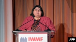 FILE - Honoree Khadija Ismayilova speaks onstage at the 2012 Courage in Journalism Awards hosted by the International Women's Media Foundation held at the Beverly Hills Hotel, Beverly Hills, California, Oct. 29, 2012.