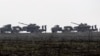 Ukrainian tanks are transported towards to the Luhansk region, Ukraine, Dec. 12, 2021