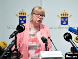 Swedish Vice Chief Prosecutor Eva-Marie Persson announces that the prosecutor will re-open the preliminary investigation against Julian Assange, who is accused of rape and sexual harassment of two women in 2010, at a news conference in Stockholm, May 13,