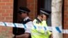 Britain Eases Threat Level After Police Arrest Second Suspect 