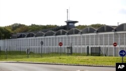 A watch tower is seen at the high-security prison of Fleury-Merogis outside Paris, Thursday, April 28, 2016. The French government estimates nearly 1,400 French prisoners are radicalized, including some 325 jailed on terror charges.