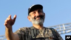 Opposition lawmaker Nikol Pashinian gestures as he addresses his supporters in Republic Square in Yerevan, Armenia on May 2, 2018.