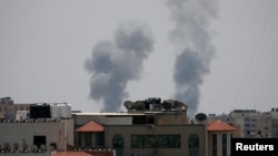Smoke rises following an Israeli airstrike in Gaza, May 29, 2018.