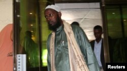 FILE - A former top leader of al-Shabaab, Mukhtar Robow, arrives for a news conference in Mogadishu, Somalia, Aug. 15, 2017. 