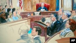 This courtroom sketch shows Paul Manafort listening to U.S. District Judge T.S. Ellis III at federal court in Alexandria, Va., Aug. 21, 2018, with a few of the jurors show at left.