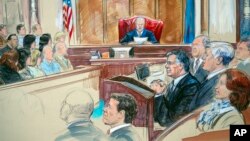FILE - This courtroom sketch shows Paul Manafort listening to U.S. District Judge T.S. Ellis III at federal court in Alexandria, Va., Aug. 21, 2018, with a few of the jurors show at left.
