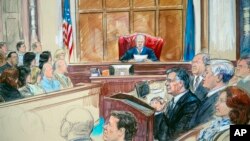 FILE - This courtroom sketch shows Paul Manafort listening to U.S. District Judge T.S. Ellis III at federal court in Alexandria, Va., Aug. 21, 2018, with a few of the jurors show at left.
