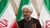 Tổng thống Iran bị ném giày khi về nước