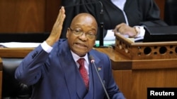 FILE - President Jacob Zuma gestures as he addresses the parliament in Cape Town, South Africa, Nov. 2, 2017.