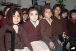 Shama (at left) and her classmates