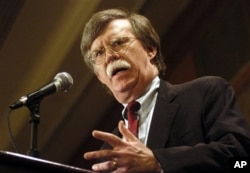 FILE - John Bolton, the U.S. ambassador to the United Nations, speaks to the Baltimore Council on Foreign Affairs in Baltimore, May 19, 2006.