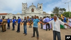 Sri Lankan soldiers secure the area around St. Anthony's Shrine, April 21, 2019, after a blast in Colombo, Sri Lanka. 