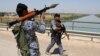 Syria, Iran Join Fight Against Iraq's Militants