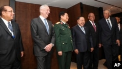 U.S. Defense Secretary Jim Mattis (2nd-L) laughs with Southeast Asian defense ministers after their meeting at the 17th International Institute for Strategic Studies (IISS) Shangri-la Dialogue, an annual defense and security forum in Asia, in Singapore, June 1, 2018.