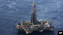 In this photo provided by the Cyprus Press and Information Office, the Noble Energy company's offshore oil and gas rig is seen some 185 kilometers off Cyprus' south coast, Monday, Nov. 21, 2011.