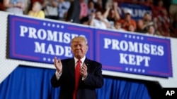 President Donald Trump arrives to speak at the Pennsylvania Farm Show Complex and Expo Center in Harrisburg, Pennsylvania, April 29, 2017, on the 100th day of his presidency.