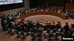 FILE - A U.N. Security Council meeting at U.N. headquarters in New York, July 31, 2014. 