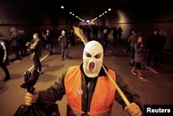 Demonstrators attend a protest against President Aleksandar Vucic and his government in central Belgrade, Serbia, March 2, 2019.