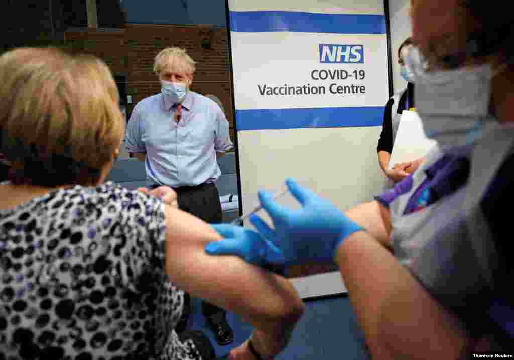 British Prime Minister Boris Johnson visits Guy&#39;s Hospital on the first day of administering a coronavirus vaccine in London, Dec. 8, 2020.