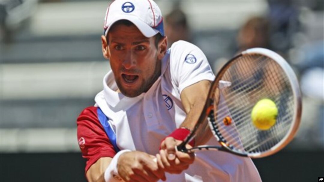 Petenis Serbia, Novak Djokovic melaju ke babak berikutnya dalam Turnamen Cina Terbuka setelah mengalahkan petenis Jerman Michael Berrer.