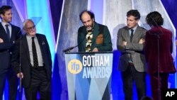 Director Luca Guadagnino (C) accepts the best feature award for "Call Me By Your Name" at the 27th annual Independent Film Project's Gotham Awards at Cipriani Wall Street on Nov. 27, 2017, in New York. 