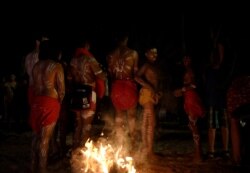 An Aboriginal dance group prepares to perform at a festival on the bank of the Darling River in Wilcannia, New South Wales, Australia, Oct. 1, 2019. Recently, Aboriginal communities held special festivals along the river "to heal the Barka."