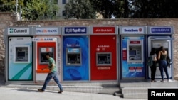 FILE - A row of ATMs in Istanbul, Turkey, September 12, 2017.