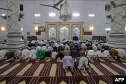 FILE—In this picture taken on March 13, 2024, Muslims offer prayers at the Jama Masjid (mosque) at Rampur in India's Uttar Pradesh state.