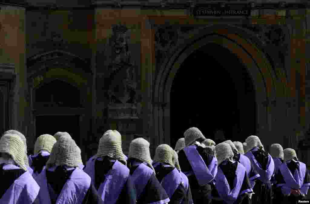 Members of the legal profession cross from Westminster Abbey to the Houses of Parliament, following the annual Judges&#39; Service in London, Britain.