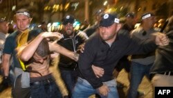 FILE - Israeli security forces scuffle with a demonstrater during a protest called by members of the Ethiopian community against alleged police brutality and institutionalised discrimination in the city of Tel Aviv, May 03, 2015. 