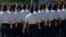 In this June 22, 2012, image taken from video, female airmen march during graduation at Lackland Air Force Base in San Antonio, Texas..