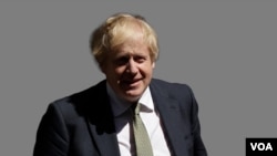 British Prime Minister Boris Johnson leaves for his weekly Prime Ministers Questions, at Downing Street in London. May 11,2020.