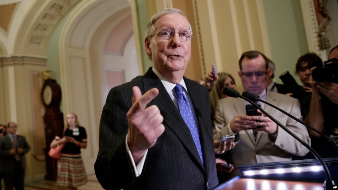 Senate Majority Leader Mitch McConnell, R-Ky., speaks to reporters about the struggle to move Supreme Court nominee Neil Gorsuch toward a final up-or-down vote on the Senate floor, at the Capitol in Washington, April 4, 2017. 