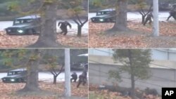 This combination of images made from Nov. 13, 2017, surveillance video released by the United Nations Command shows a North Korean soldier fleeing to South Korea.