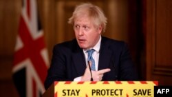 Britain's Prime Minister Boris Johnson takes part in a virtual press conference inside 10 Downing Street in central London on Jan. 7, 2021.