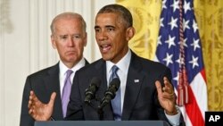 President Barack Obama, with Vice President Joe Biden, left, outlines the "It's On Us" campaign to help colleges and universities to prevent and respond to sexual assault on campus, at the White House in Washington, Sept. 19, 2014. 